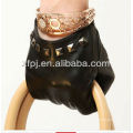 lady wearing short Rivet style leather glove
